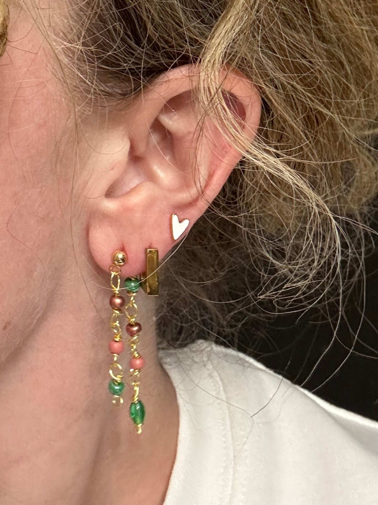 “Business in the front, party in the back” earrings