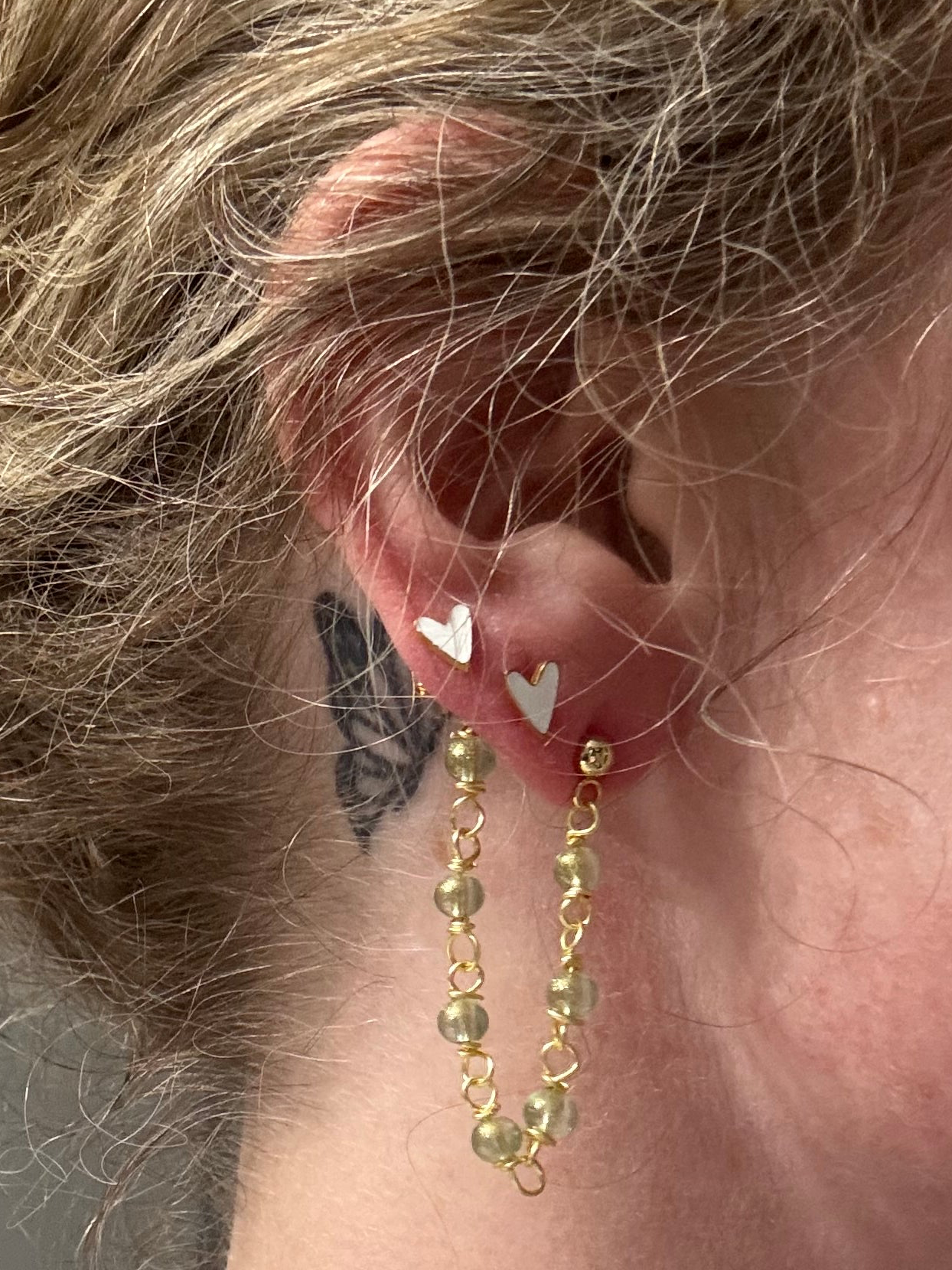 “Business in the front, party in the back” earrings